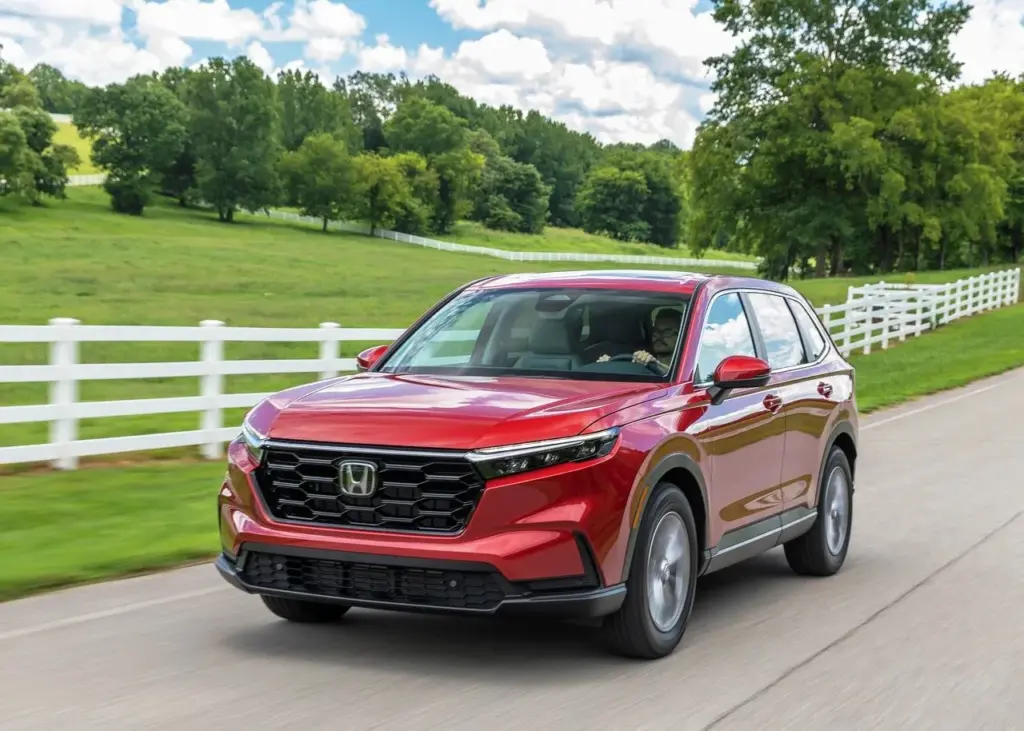 Radiant Red Metallic CR-V Drive on The Farm During Dayligt