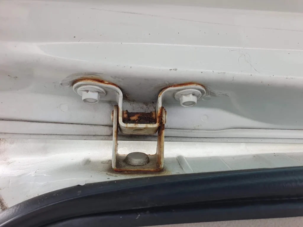 Rusted Trunk Hinge